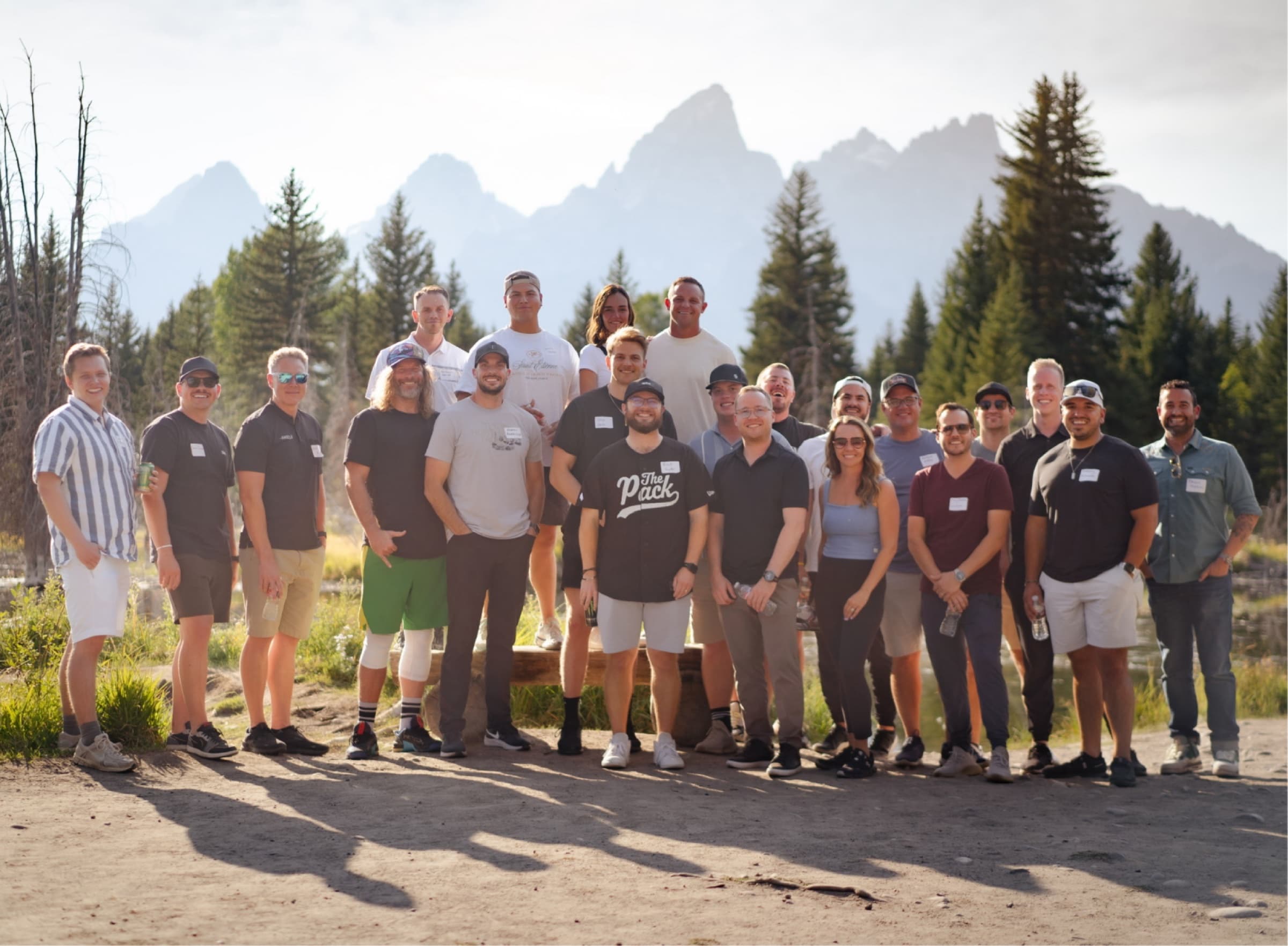 Retreat group photo with Grand Teton mountains in the background